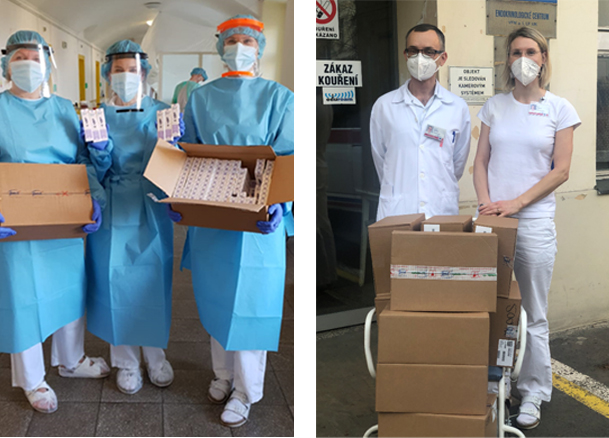 Pracovníci VFN v Praze přebírají darované krémy